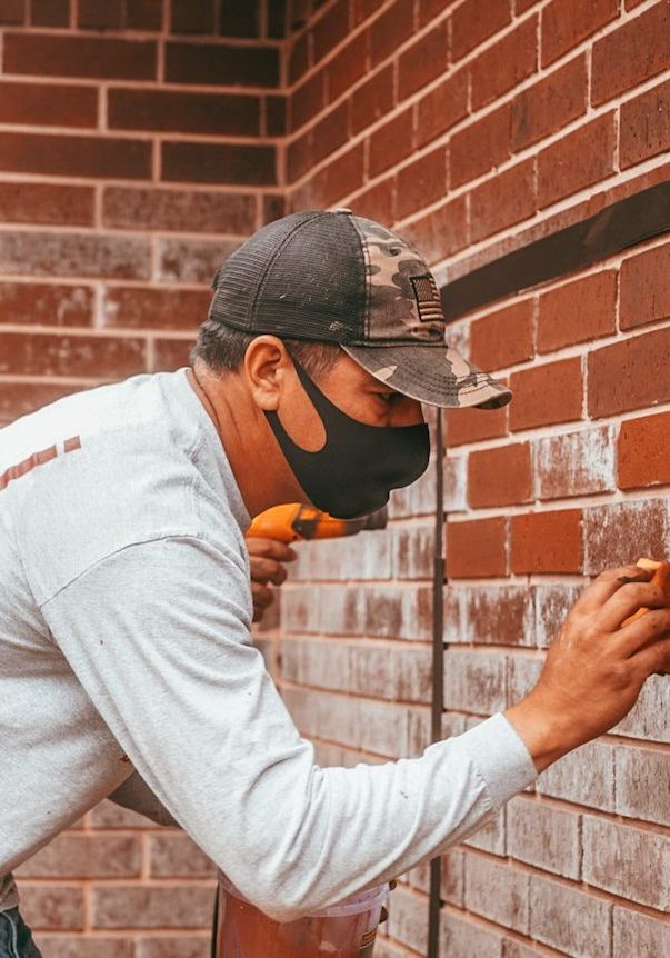 Brick Restoration Mason Crew Working masonry contractor